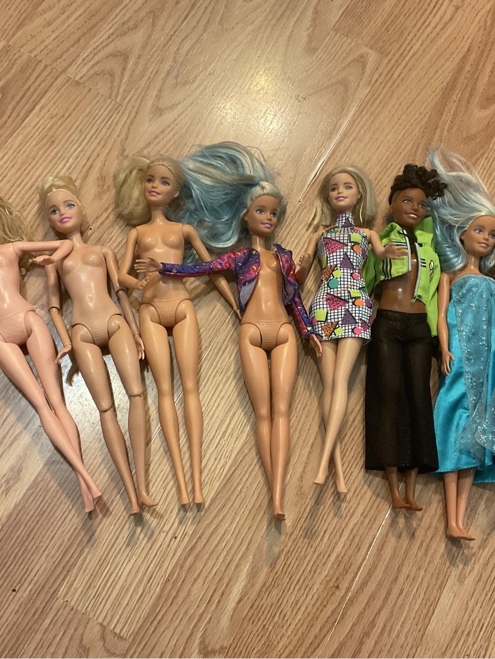 10 Barbie dolls 11”